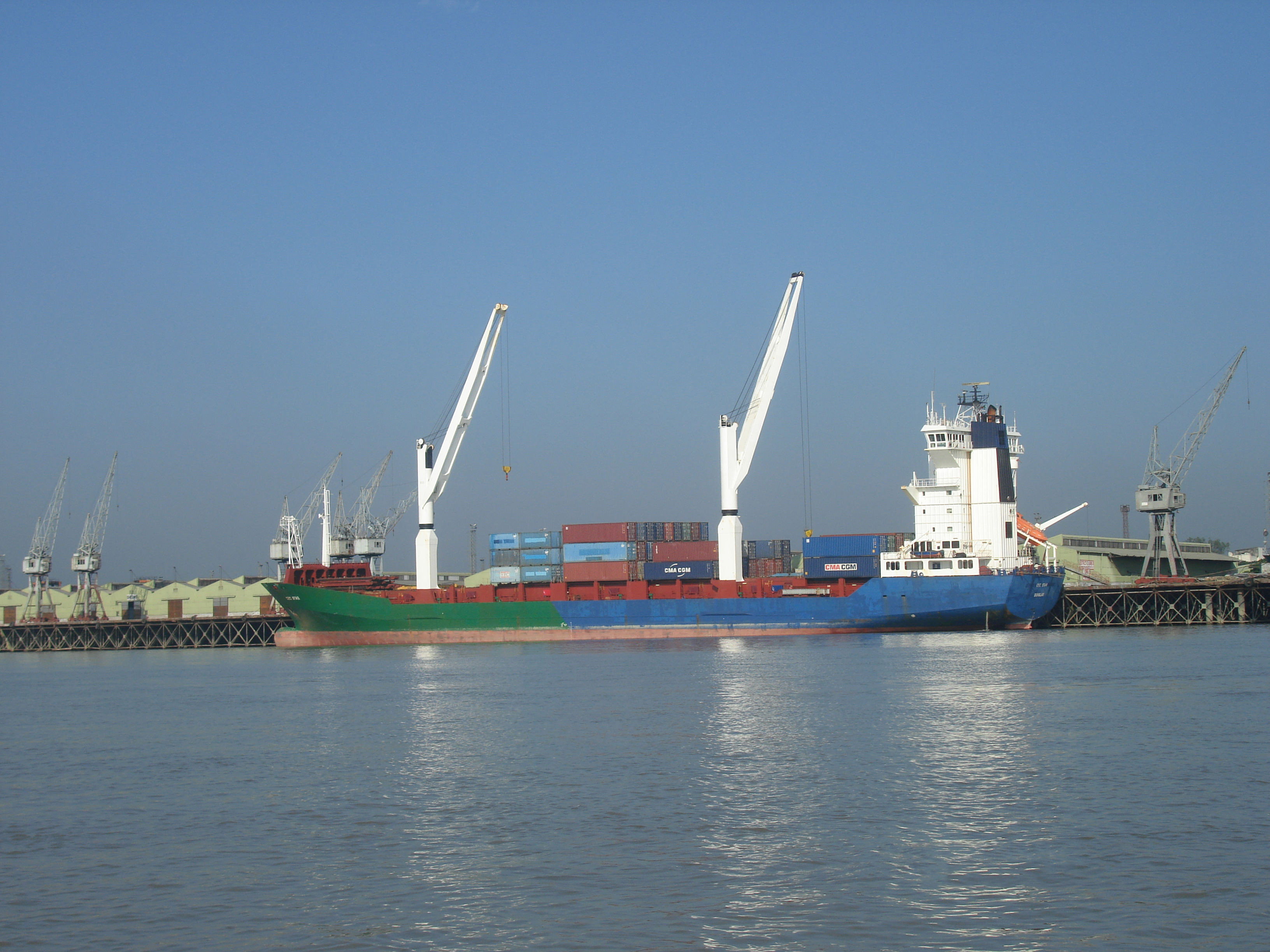 Cargo ships and containers at Chattogram port, Bangladesh, in a public-domain file photo. Bangladesh has begun bringing more of the port's terminals under foreign operators.