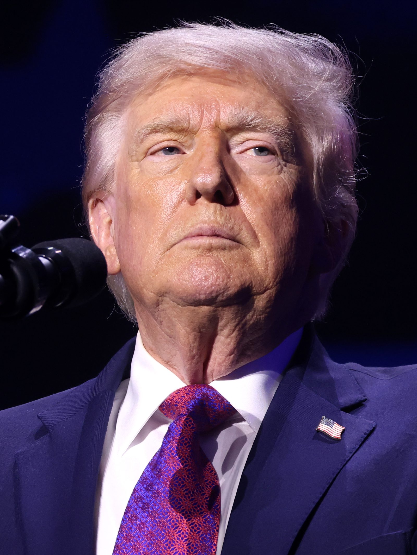 Donald Trump speaking at a "Build the Red Wall" rally in Phoenix, Arizona, on 17 April 2026. The photo predates the court order in his defamation case against the BBC.