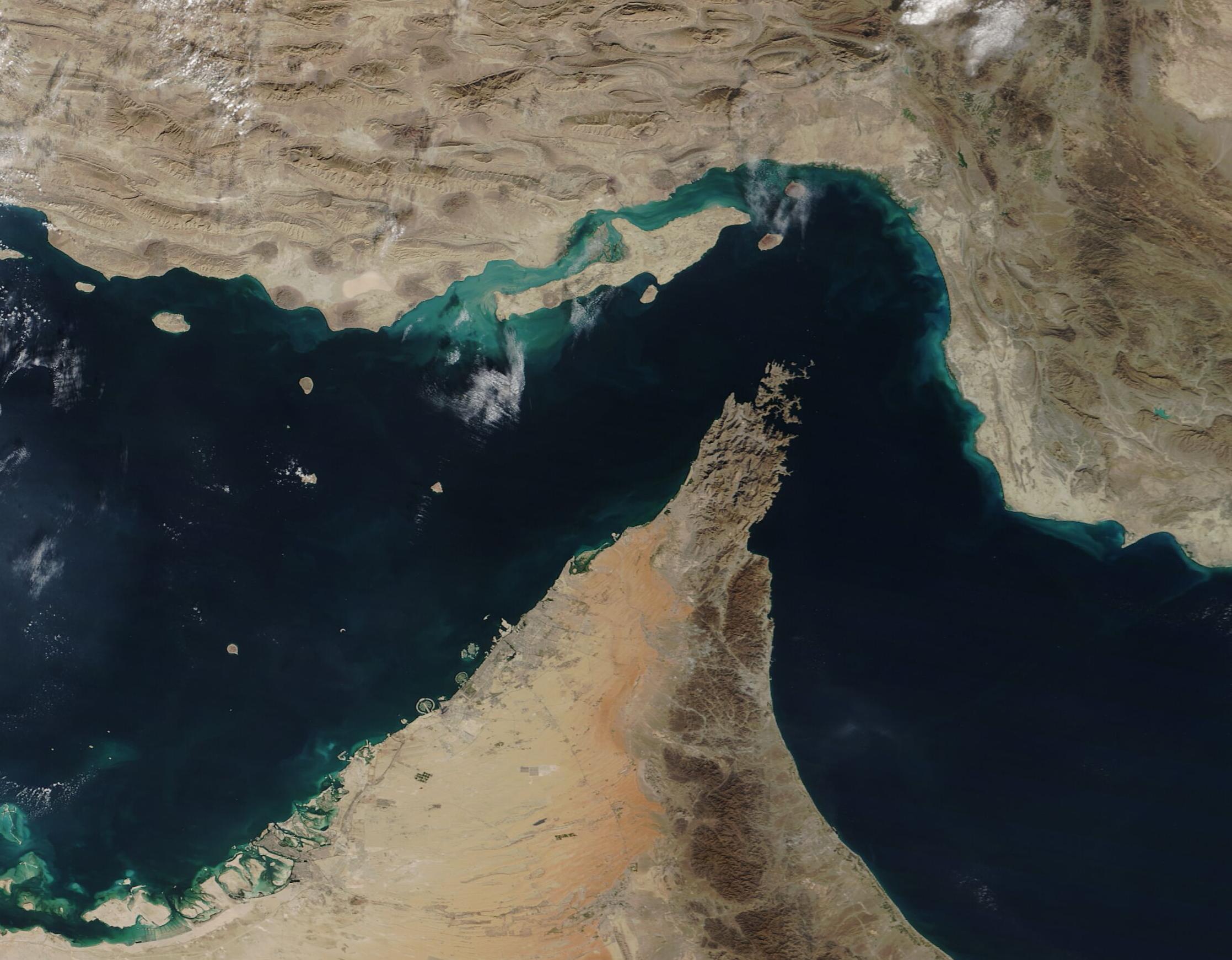 Satellite view of the Strait of Hormuz between Iran and the Arabian Peninsula, taken by NASA's Terra satellite on 2 December 2020. Representative image of the waterway. NASA / MODIS, public domain.